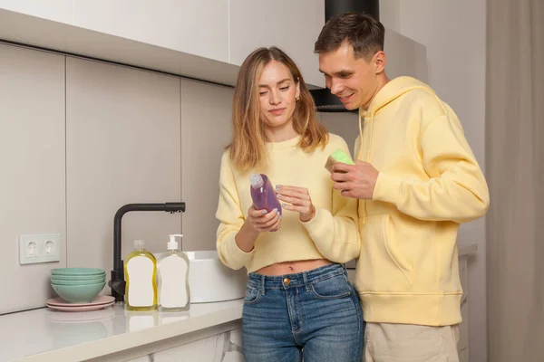 Happy Man Woman Relationship Looking Dishwashing Liquid Blank Label Kitchen — Stock Photo, Image