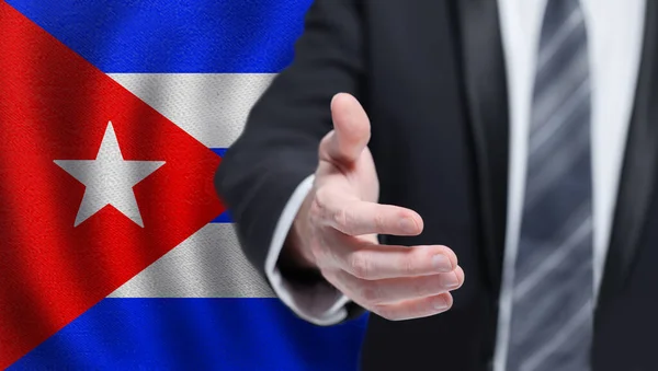 Polityka Współpraca Koncepcja Podróży Kubie Ręka Tle Kubańskiej Flagi — Zdjęcie stockowe