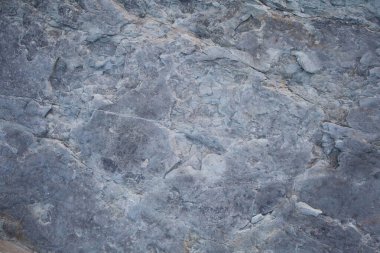 Mavi ve gri kayalık yüzey, arka plan, çatlaklı grunge deseni