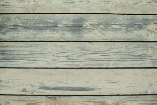 テクスチャされた抽象的な木製ライトブルーボードの背景 — ストック写真