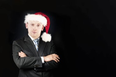 Başarılı iş adamı, siyah arka planda Noel Baba, Noel portresi