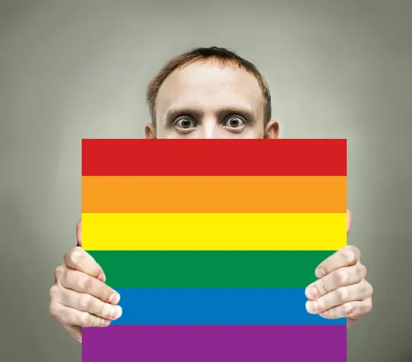 Surprised Man Holding Sign Paper Lgbt Flag — Stock Photo, Image