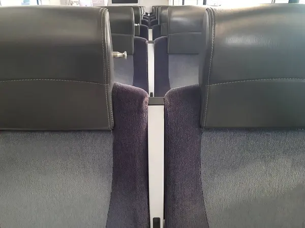 Empty train seats close up