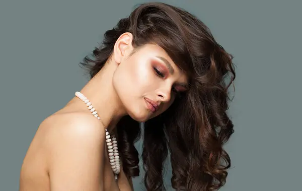 Glamorous jewelry model. Woman with bijou close up
