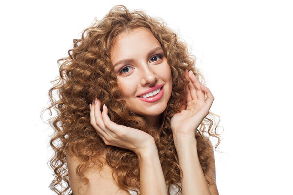 Excited good-looking redhead woman with clean skin, curly hairstyle and natural make-up. Female model on white background