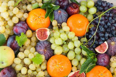 Parlak yaz meyveleri arka planı. Renkli organik yiyecekler