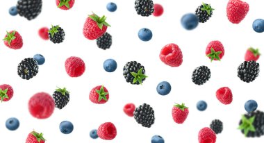 Collection of various falling fresh ripe wild berries isolated on white background. Raspberry, blackberry and blueberry from different angles