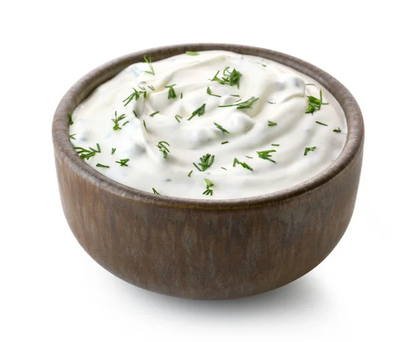 stock image Brown ceramic bowl of fresh sour cream dip sauce with herbs isolated on white background