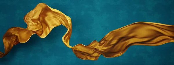 Желтая Шелковая Ткань Плавающая Фоне Синей Стены — стоковое фото