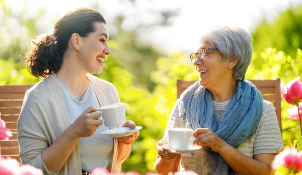 Happy Young Woman Her Mother Drinking Tea Summer Morning Family — Stock Photo, Image