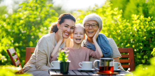 Happy Little Girl Her Mother Grandmother Drinking Tea Summer Morning — Stock Photo, Image