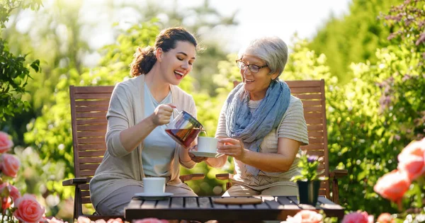 Happy Young Woman Her Mother Drinking Tea Summer Morning Family — Stock Photo, Image
