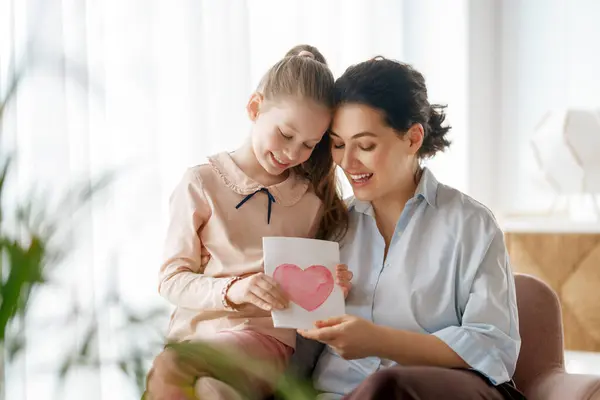Happy Mother Day Child Daughter Congratulating Mom Giving Her Postcard Royalty Free Stock Photos