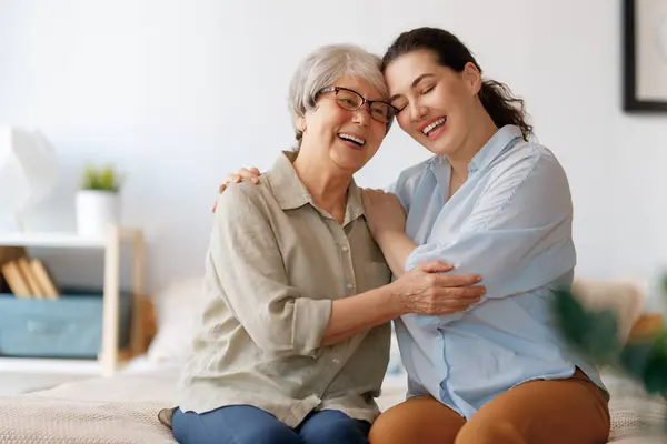 Beautiful Mother Daughter Talking Smiling While Sitting Bed Home Stock Photo