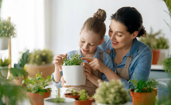 Cute Child Girl Helping Her Mother Care Plants Mom Her — Stock Photo, Image