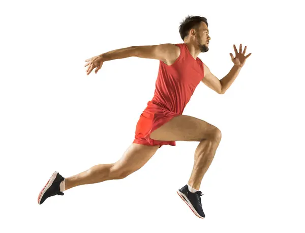 Een Atletische Jongeman Het Rood Loopt Geïsoleerd Wit Stockafbeelding