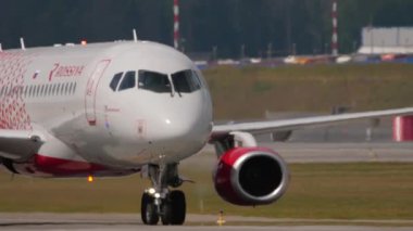 MOSCOW, RUSSIAN FEDERATION - JULY 29, 2021: Commercial aircraft of Rossiya taxiing to Sheremetyevo airport, Moscow. View of the cockpit of the aircraft. Tourism and travel concept