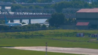 SOCHI, RUSSIA - JULY 28, 2022: Passenger plane Boeing 737 of Pobeda arrival at Sochi airport. Moment of landing, touchdown and braking
