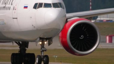 MOSCOW, RUSSIAN FEDERATION - JULY 29, 2021: Footage of jet plane Royal Flight taxiing at Sheremetyevo airport, front view. Haze on a hot day on the runway