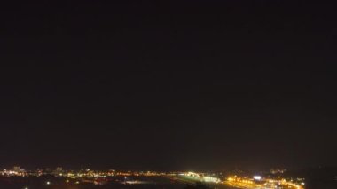 Timelapse of aviation traffic at the airport, night footage. Tourism and travel concept.