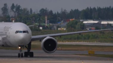 MOSCOW, RUSSIAN FEDERATION - JULY 29, 2021: Commercial plane of Nordwind airlines taxiing at Sheremetyevo airport, front view. Airplane on the airfield. Tourism and travel concept.