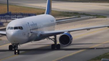 FRANKFURT AM MAIN, GERMANY - JULY 19, 2017: Passenger jet plane Boeing 767 Condor taxiing after landing at Frankfurt Airport, front view. Tourism and travel concept