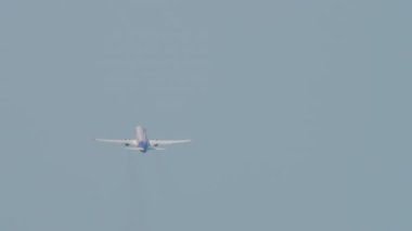 SOCHI, RUSSIA - AUGUST 03, 2022: Boeing 737 of Smartavia takeoff, departure at Sochi airport. Passenger plane flies, rear view. Smartavia Russian airline. Tourism and travel concept