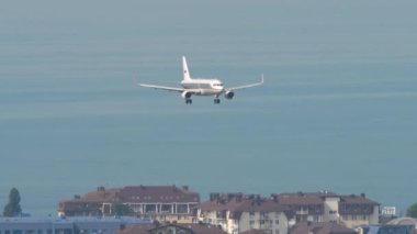 SOCHI, RUSSIA - AUGUST 03, 2022: Airbus A320 of Aeroflot with retro livery Dobrolet approaching landing at Sochi airport. Tourism and travel concept