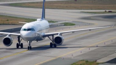 FRANKFURT AM MAIN, GERMANY - JULY 19, 2017: Jet passenger plane of Lufthansa taxiing at Frankfurt airport. Lufthansa German flag carrier. Tourism and travel concept