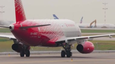 MOSCOW, RUSSIAN FEDERATION - JULY 28, 2021: Airplane of Rossiya taxiing at Sheremetyevo Airport. Jet passenger aircraft on the taxiway. Tourism and travel concept