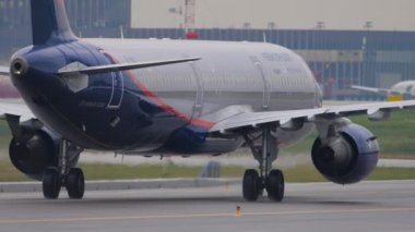 MOSCOW, RUSSIAN FEDERATION - JULY 28, 2021: Airplane of Aeroflot taxiing at Sheremetyevo Airport SVO. Tourism and travel concept. Aircraft closeup