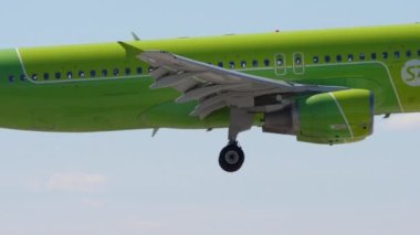 NOVOSIBIRSK, RUSSIAN FEDERATION - JUNY 12, 2022: Airbus A320, RA-73407 of S7 Airlines landing at Tolmachevo airport. Traffic on a summer day, airfield. Tourism and travel concept