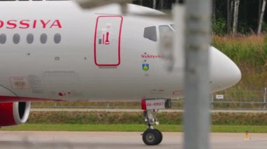 MOSCOW, RUSSIAN FEDERATION - JULY 28, 2021: Airplane of Rossiya taxiing at Sheremetyevo Airport. Jet passenger aircraft on the taxiway. Tourism and travel concept