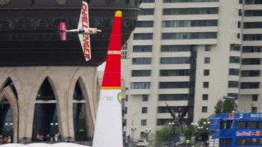 KAZAN, RUSSIAN FEDERATION, JUNE 14, 2019: Sports light aircraft performing aerobatics at the Red Bull competition in Kazan