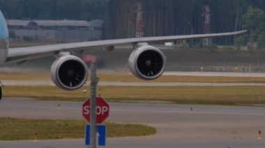 MOSCOW, RUSSIAN FEDERATION - JULY 29, 2021: Middle shot of Boeing 747 Korean Air Cargo taxiing at Sheremetyevo Airport. Jumbo jet on the taxiway, front view