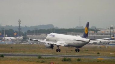 FRANKFURT AM MAIN, GERMANY - JULY 20, 2017: Airbus A321 of Lufthansa landing at Frankfurt Airport. Jet plane flies. Aircraft arriving. Tourism and travel concept