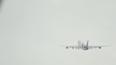 PHUKET, THAILAND - DECEMBER 02, 2016: Boeing 747 of Thai Airways take off at Phuket airport, rear view. Jumbo jet departure