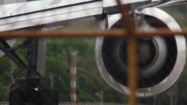 Aircraft jet engine close-up, airplane chassis. Wheels rubber tire rear landing gear racks airplane aircraft, under wing view