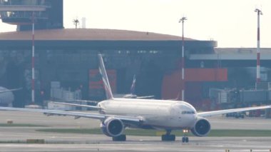 MOSCOW, RUSSIAN FEDERATION - JULY 30, 2021: Boeing 777 Aeroflot taxiing at Sheremetyevo airport, Moscow. Passenger flight, wide-body aircraft. Tourism and travel concept