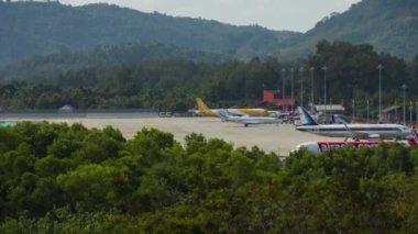 PHUKET, THAILAND - NOVEMBER 26, 2019: Timelapse of airport traffic. Footage of airfield Phuket