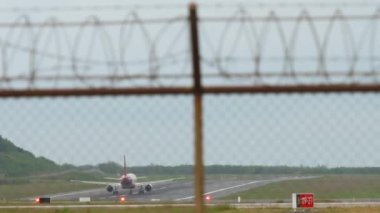 Rear view of a jet plane taking off. Passenger flight departure. Tourism and travel concept