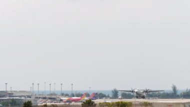 PHUKET, THAILAND - JANUARY 29, 2023: Turboprop aircraft ATR 72-600 of Bangkok Airways taking off at Phuket airport. Tourism travel concept