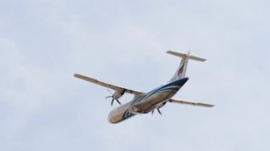 PHUKET, THAILAND - JANUARY 29, 2023: Passenger plane ATR 72-600, HS-PZE Bangkok Airways departure at Phuket airport. Airplane fly away. Tourism travel concept