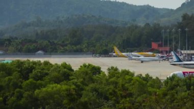 PHUKET, THAILAND - NOVEMBER 26, 2019: Timelapse of airport traffic. Footage of airfield Phuket
