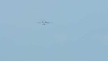 Multipurpose transport aircraft landing at Sochi airport. Twin-engine jet aircraft UVP in civil aviation. Aircraft is flying