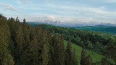 Aerial view of a summer mountain landscape with rocky peaks on the background. Tatra Mountains, Poland