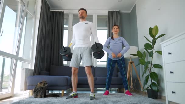 Caucasian Couple Doing Strength Training Home Cozy Bright Room Slow — Stockvideo