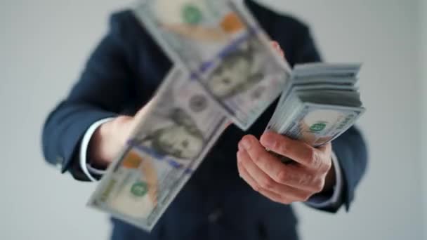 Formally Dressed Man Makes Money Rain Dollar Bills Slow Motion — Stok video