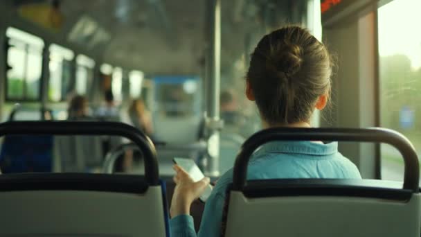 Public Transport Woman Glasses Tram Using Smartphone Chatting Texting Friends — Vídeo de Stock