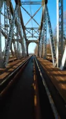 Vertical video. Fast flight over the railway. Filmed on FPV Drone.